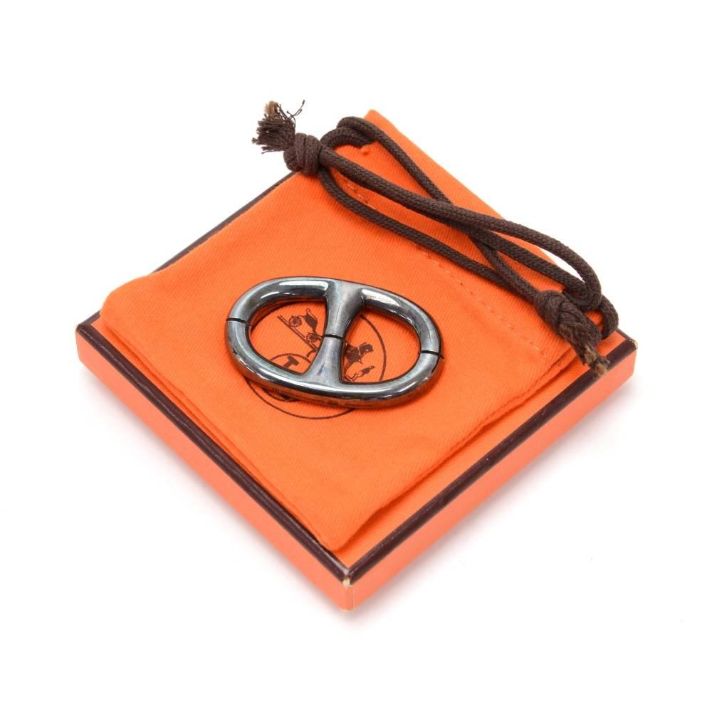 Hermes Chaine Fancre scarf ring in palladium. Perfect to keep your scarf in place. Would make a wonderful statement.

Made in: France
Size: 2 x 1.2 x 0 inches or 5 x 3 x 0 cm
Color: Gray
Dust bag:   Yes included  
Box:   Yes included 
RRP: