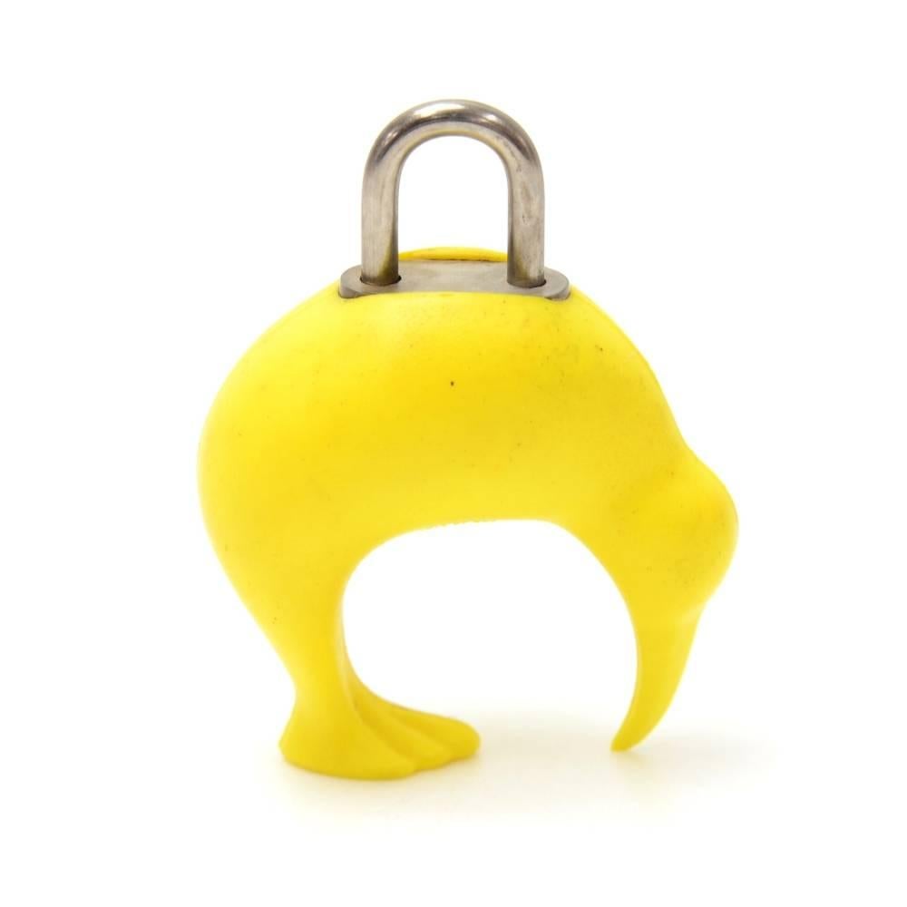 Louis Vuitton Yellow Kiwi motif LV Cup limited key pad lock from year 2000. A very rare item to find.  It can be used to lock your bag or simply secured to where you like. 

Made in: France
Size: 2 x 2.6 x 0 inches or 5 x 6.5 x 0 cm
Color: