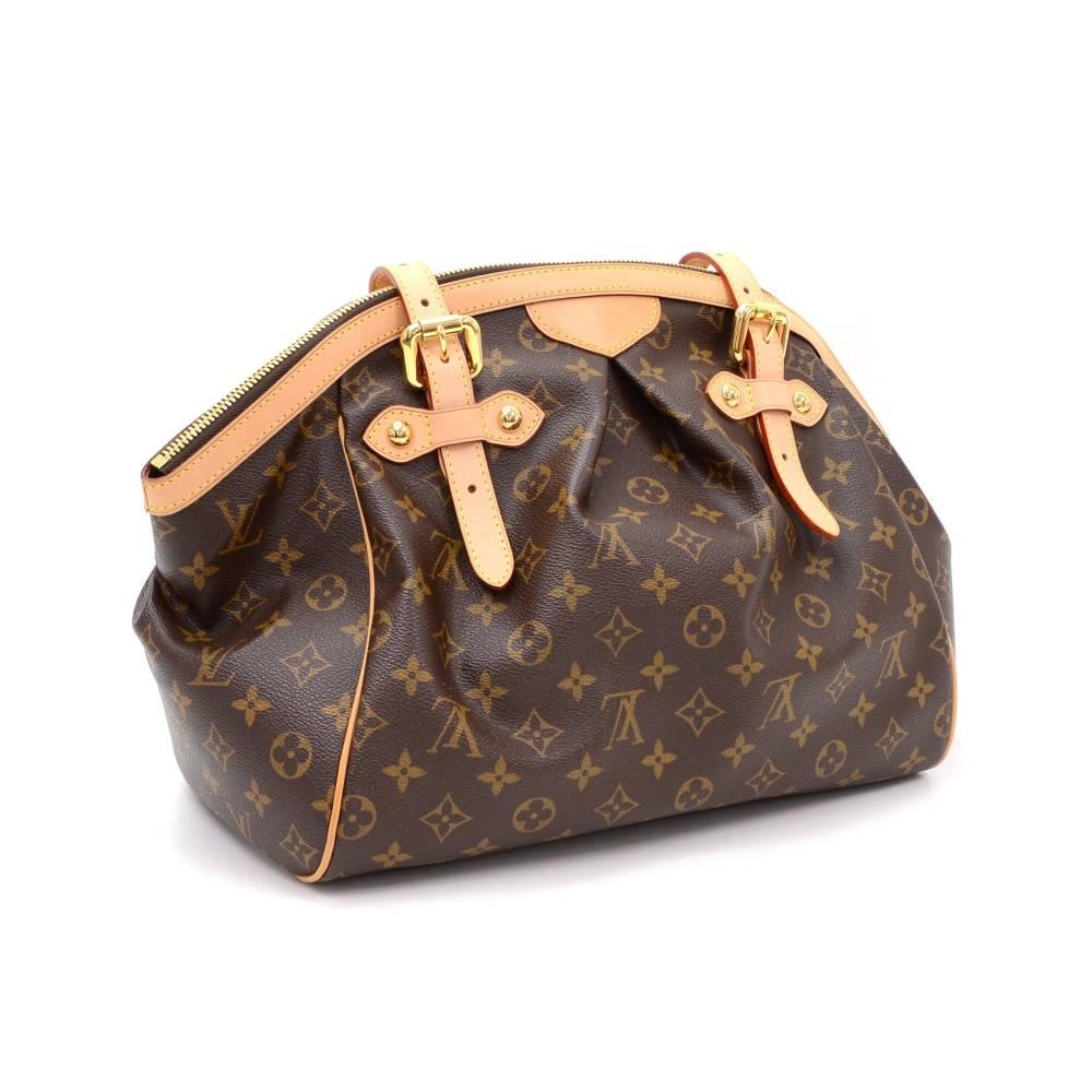 Louis Vuitton Tivoli GM bag in Monogram canvas. Top is closed with zipper. Inside has brown fabric lining and 2 open pockets and 1 for mobile or glasses. It is specially designed to keep all your items perfectly organized!

Made in: France
Serial