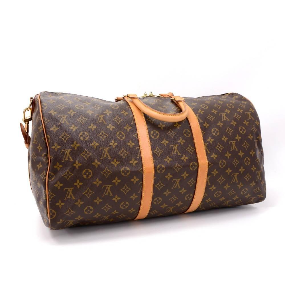 Louis Vuitton Keepall Bandouliere 55 a classic from the Louis Vuitton travel bag collection. This spacious sized version in Monogram canvas and a double zipper for secure and easy access. Great for any trip!

Made in: France
Serial Number: