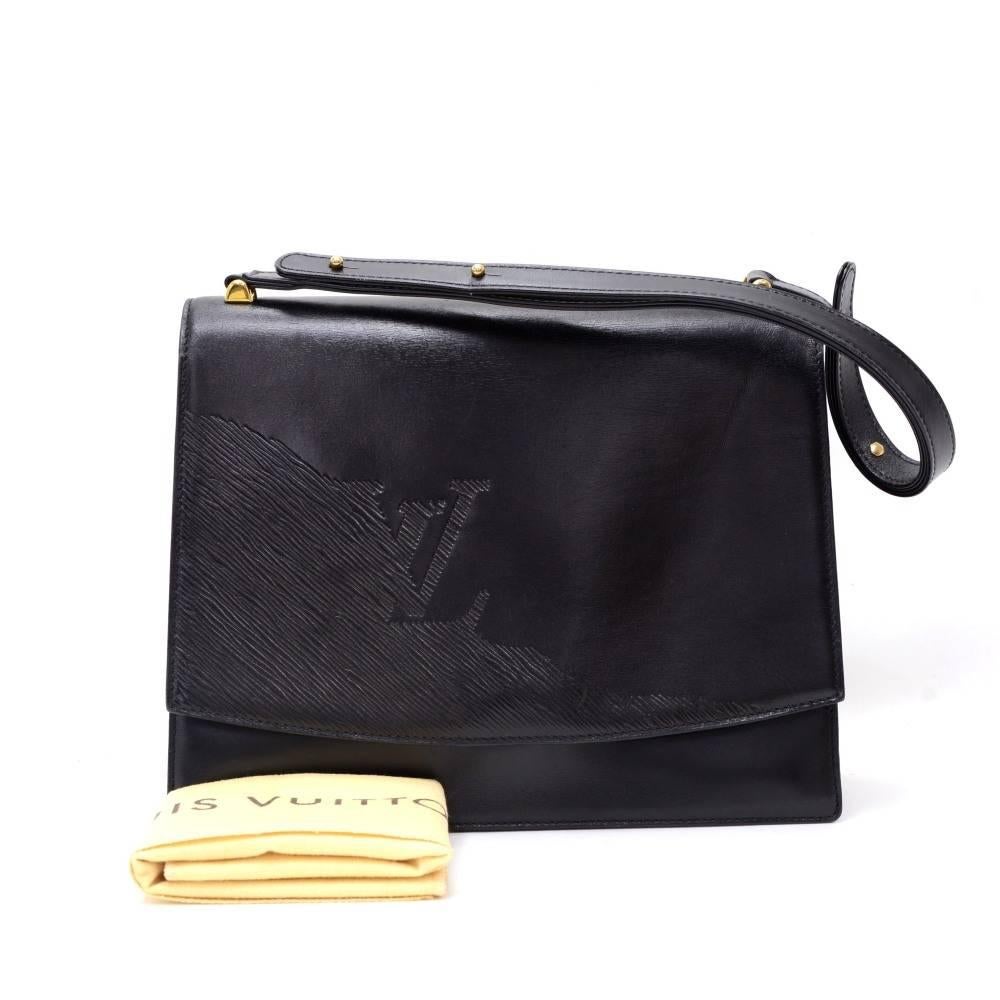 Louis Vuitton signature shoulder bag in black leather. Flap is secured with stud closure. On inside, it has 3 open compartments. Perfect for night out and parties. 

Made in: France
Serial Number: MI0911
Size: 14.2 x 8.7 x 1.2 inches or 36 x 22 x 3
