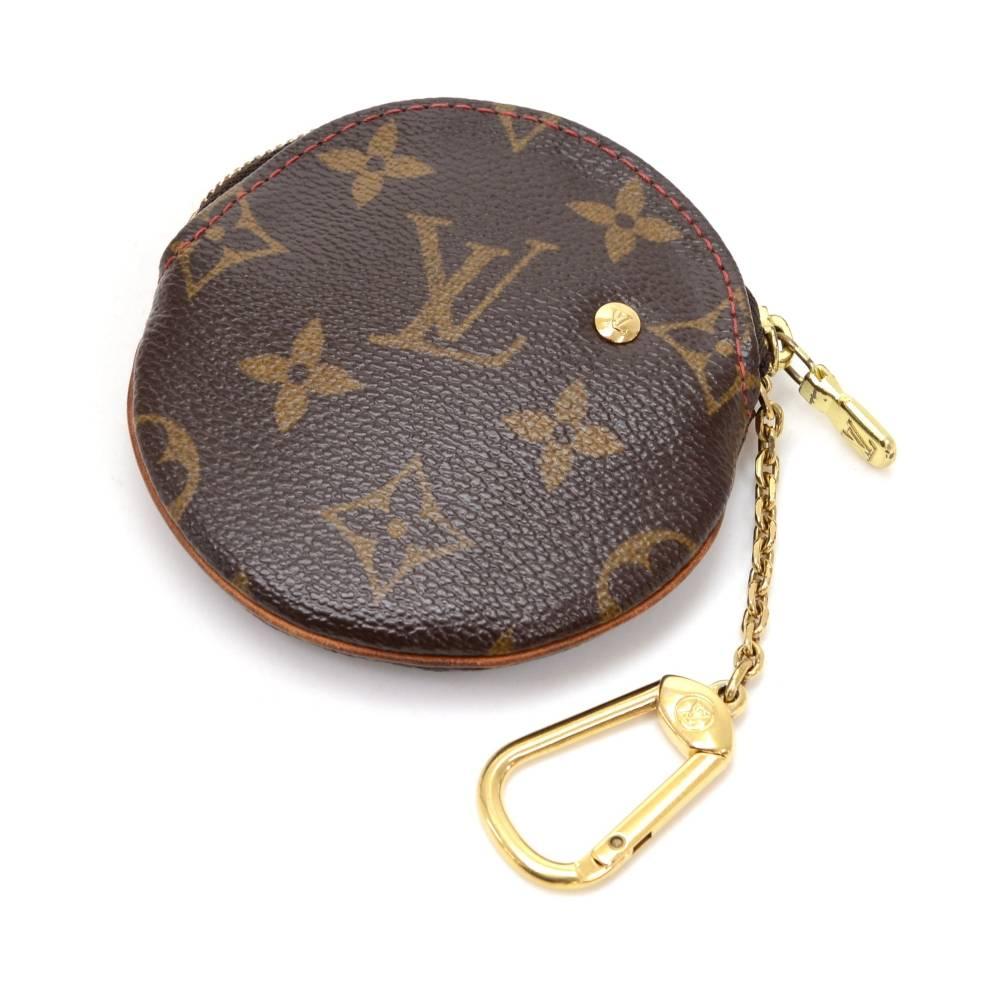 Louis Vuitton Porte Monnaie Round coin case in Monogram Cherry canvas. It is from 2005 Limited Edition. It can be used in either way as you please.

Made in: France
Serial Number: S P 0 0 1 3
Size: 3.7 x 3.7 x 0 inches or 9.5 x 9.4 x 0 cm
Color: