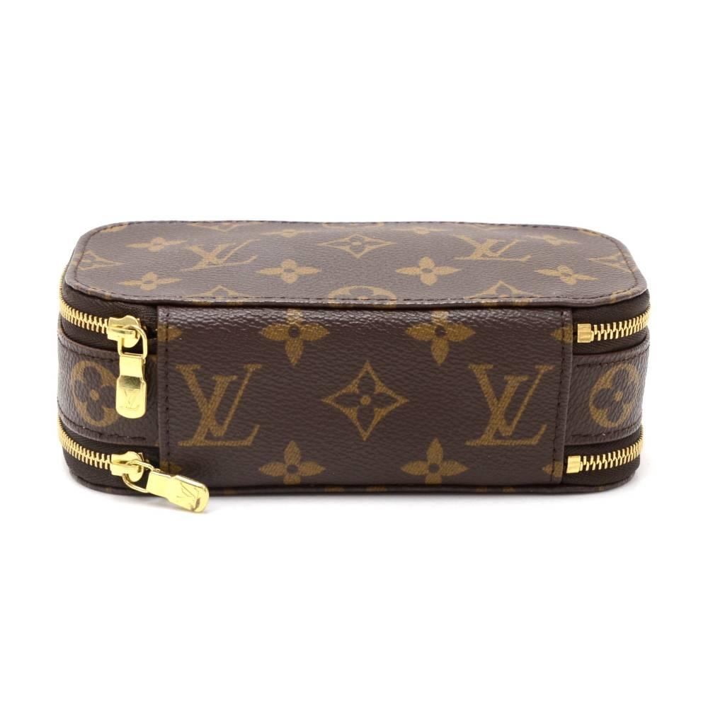 Louis Vuitton Trousse Blush PM make up pouch in monogram canvas. Keep items organize with rubber bands and separate open pocket and keep it all safe in one place. It is discontinued item.

Made in: France
Serial Number: VI0062
Size: 6.7 x 3.7 x 2.2