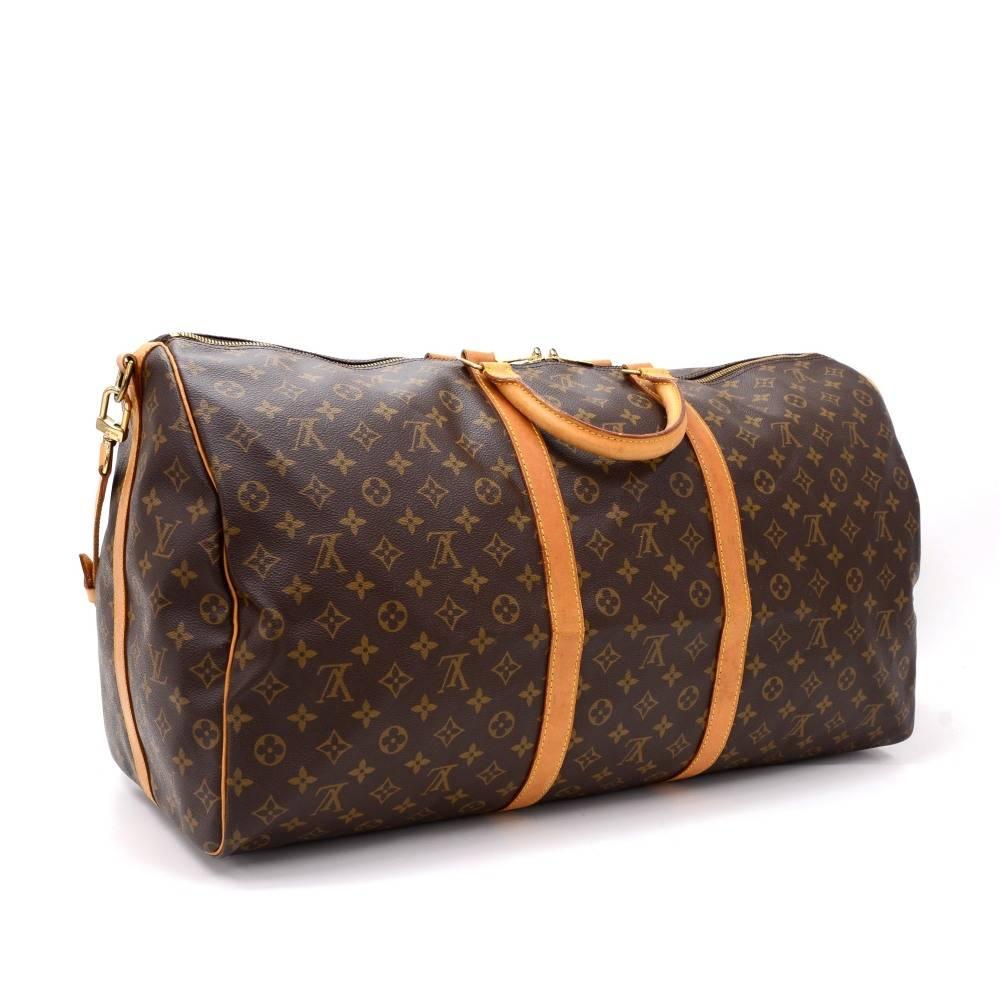 Louis Vuitton Keepall Bandouliere 60 a classic from the Louis Vuitton travel bag collection. This spacious largest sized version in Monogram canvas and a double zipper for secure and easy access. Great for any trip!

Made in: France
Serial Number: T
