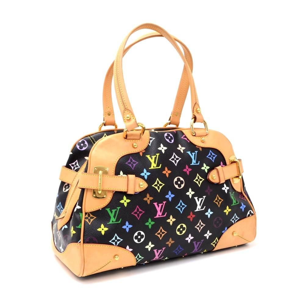 This is Louis Vuitton Claudia hand bag in black multicolor monogram canvas. Top has double zipper closure. Inside is in dark brown alkantra lining with 1 open pocket and 1 for mobile or glass. Very stylish item.

Made in: France
Serial Number: A S 0
