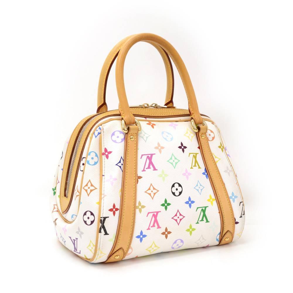 Louis Vuitton Priscilla white multicolor monogram hand bag. Outside has small flap pocket with buckle. Top closure access with double zipper. Inside has red alkantra lining with 1 open pocket and 1 for mobile or glasses. Stunning item!

Made in: