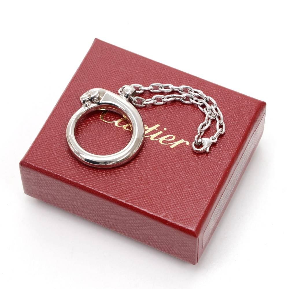 Cartier silver tone Panther hoop key holder/bag charm. Cartier engraved on it. Very stunning item! 

Size: 3.7 x 0 x 0 inches or 9.5 x 0 x 0 cm
Color: Silver
Dust bag:   Not included  
Box:   Yes included 

Condition
Overall: 9 of 10 Excellent pre
