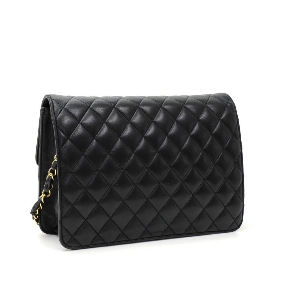 Chanel Black leather quilted shoulder bag. It has a flap with famous CC twist lock on the front. Inside has Chanel red leather lining with 1 zipper pocket. It can be used as a shoulder bag or clutch. This is a very smart and classic design which