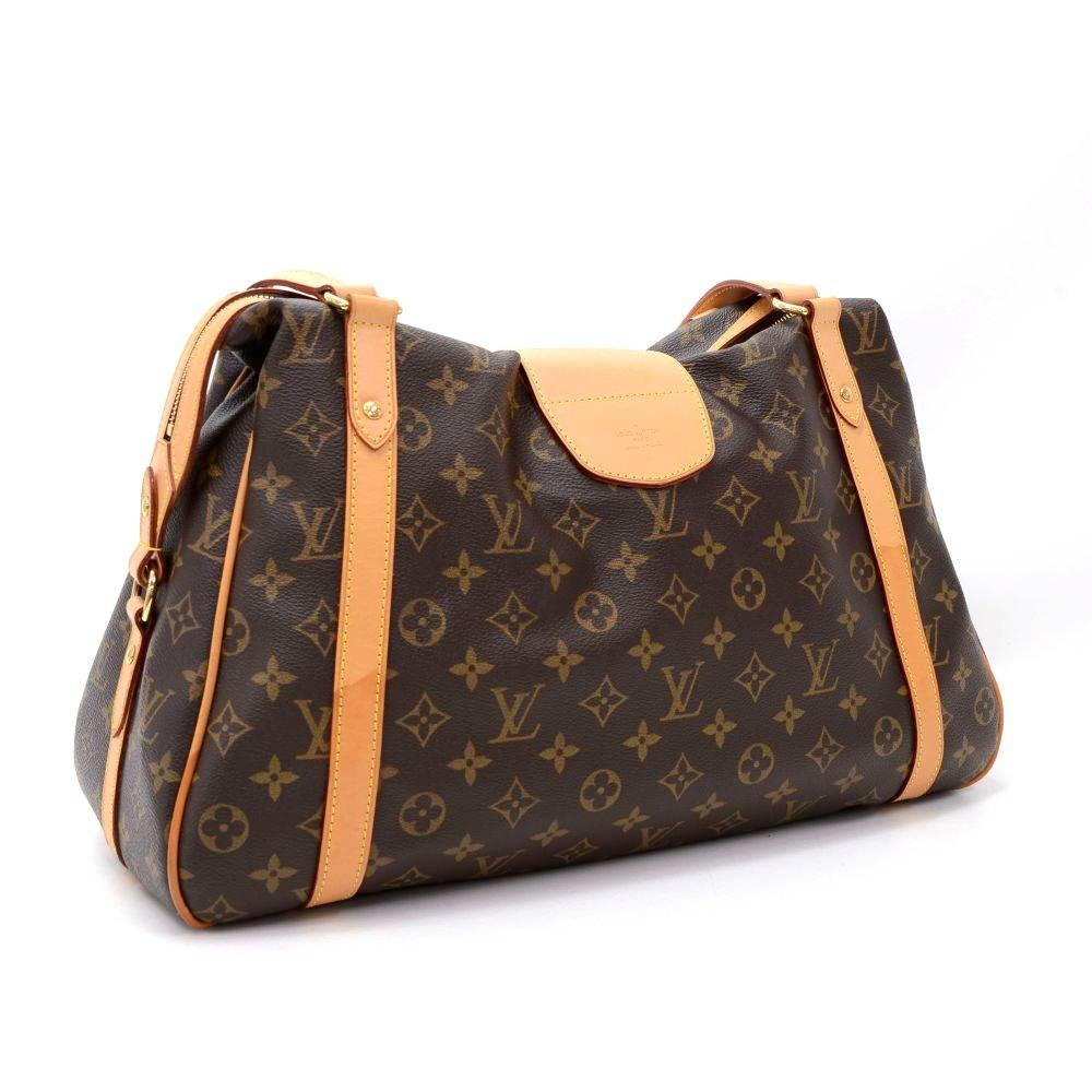 Louis Vuitton Stresa GM tote bag in monogram canvas. Top has small flap with pusk lock and zipper closure. Inside has canvas lining with 2 open pockets. Great for daily use.

Made in: France
Serial Number: F L 0 1 1 0
Size: 17.3 x 11.4 x 5.9 inches