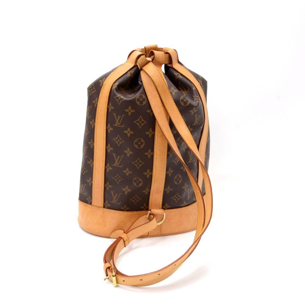 This is Louis Vuitton Randonnee shoulder bag / backpack. Supple and spacious, stylish and perfectly elegant bag. This practical bag has straps which can be used on one shoulder or separated and used as a backpack. This is long discontinued