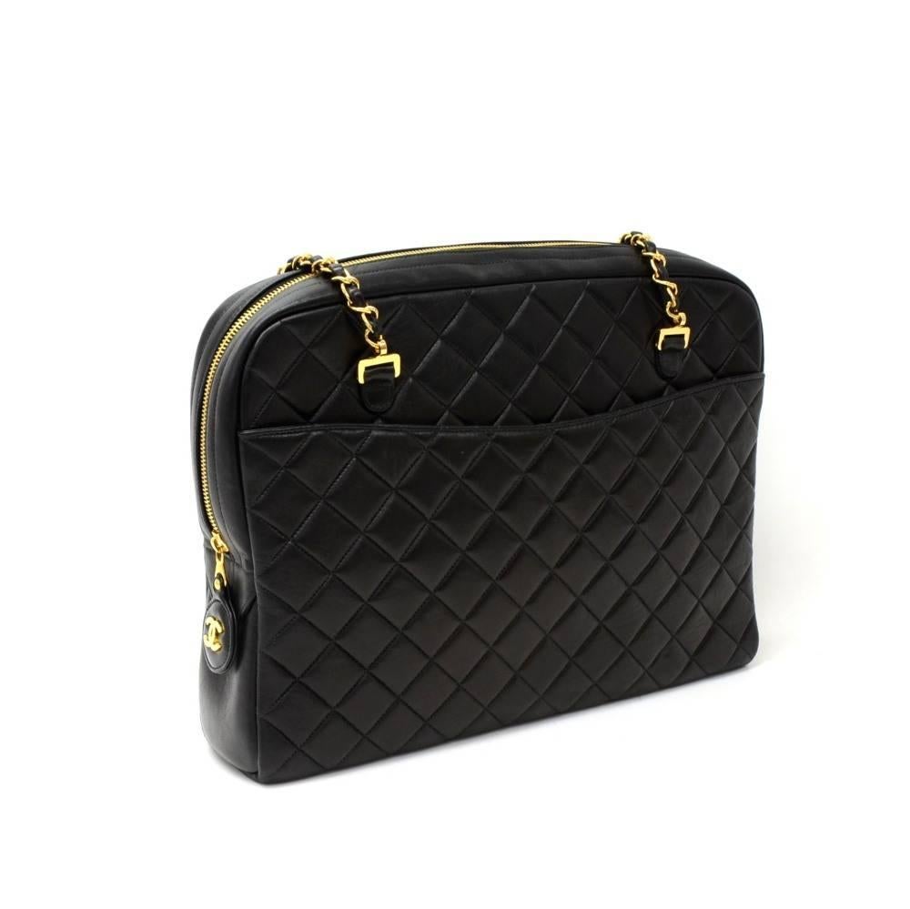 Chanel black quilted leather shoulder bag. It has zipper closure and 1 exterior open pocket on each side. Inside has Chanel red lining and 2 open pockets. Comfortably carry on shoulder and offers great capacity. 

Made in: France
Serial Number: