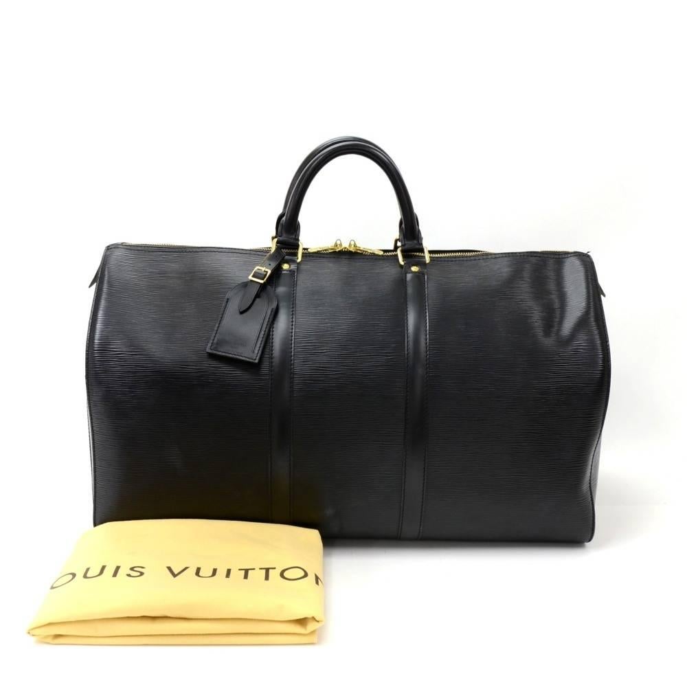 Authentic Louis Vuitton Keepall 50 in Epi leather. It is a classic of the Louis Vuitton travel bag collection. This spacious large version features comfortable rounded leather handles and a double zipper for easy access. Truly popular color. 

Made