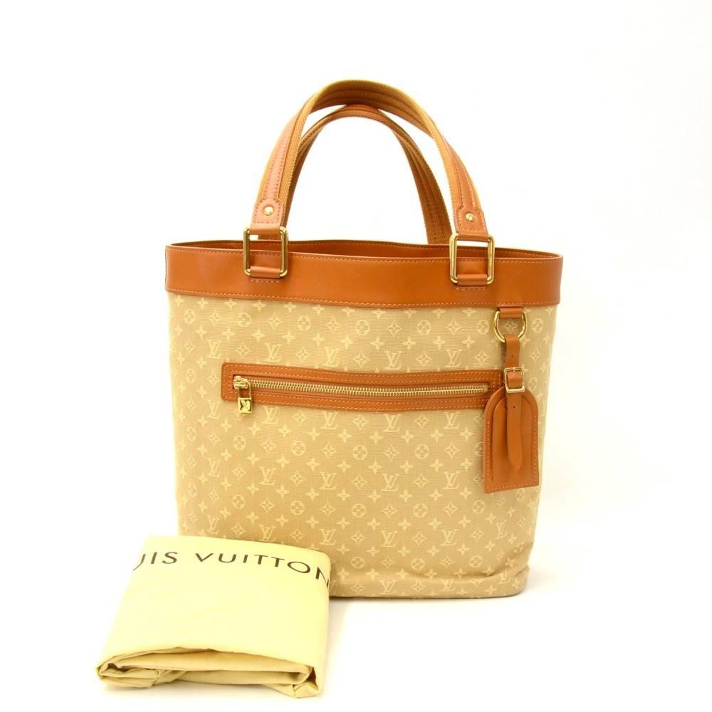 Louis Vuitton Lucille GM bag in mini monogram canvas. Outside has 1 zipper pocket. Open access. Inside has fabric lining and 1 zipper and 4 open pockets. Beautiful bag perfect for shopping or daily use.

Made in: France
Serial Number: SR0014
Size:
