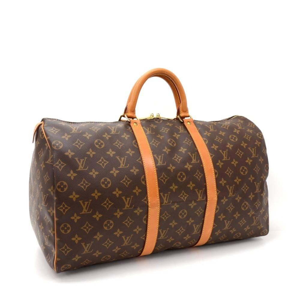 Louis Vuitton Keepall 50 is a classic of the Louis Vuitton travel bag collection. This spacious medium sized version in Monogram canvas and a double brass zipper. A great companion wherever you go.

Made in: France
Serial Number: S P 1 9 0 2
Size: