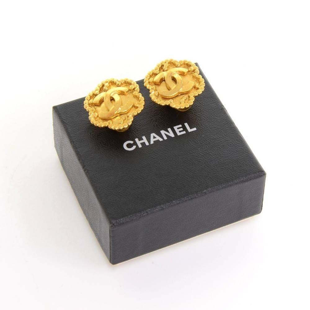 Chanel gold tone earrings. CHANEL 96 CC A Made in France engraved on the back. They look truly wonderful and have easy and secure clip to put them on! 

Made in: France
Size: 0.8 x 0.8 x 0 inches or 2 x 2 x 0 cm
Color: Gold
Dust bag:   Not included 
