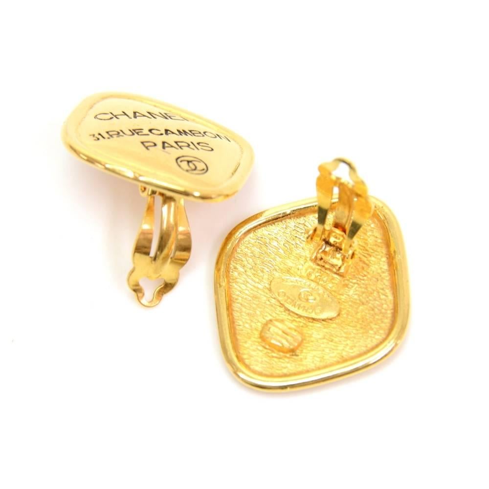 Chanel gold tone earrings. CHANEL CC Made in France engraved on the back. They look truly wonderful and have easy and secure clip to put them on! 

Made in: France
Size: 1.4 x 1.2 x 0 inches or 3.5 x 3 x 0 cm
Color: Gold
Dust bag:   Not included 