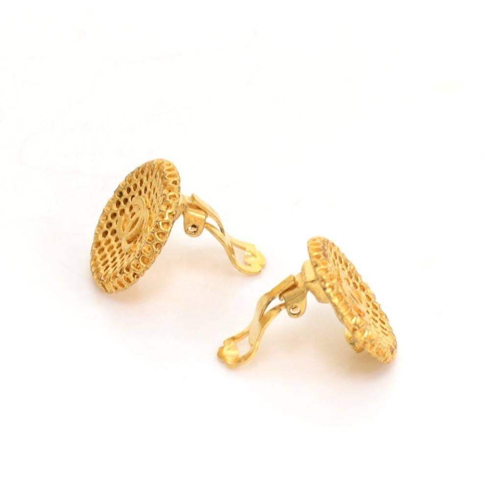Vintage Chanel gold tone earrings. CHANEL 96 CC P Made in France is engraved on the back. They look truly wonderful and have easy and secure clip to put them on! 

Made in: France
Size: 0.7 x 0.7 x 0 inches or 1.7 x 1.7 x 0 cm
Color: Gold
Dust bag: 