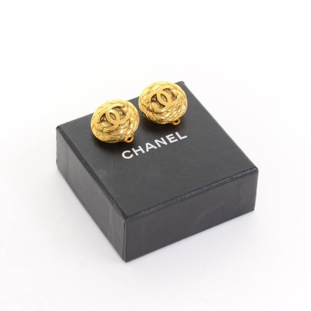 Vintage Chanel gold tone earrings. CHANEL 96 CC A Made in France engraved on the back. They look truly wonderful and have easy and secure clip to put them on! 

Made in: France
Size: 0.8 x 0.8 x 0 inches or 2 x 2 x 0 cm
Color: Gold
Dust bag:   Not