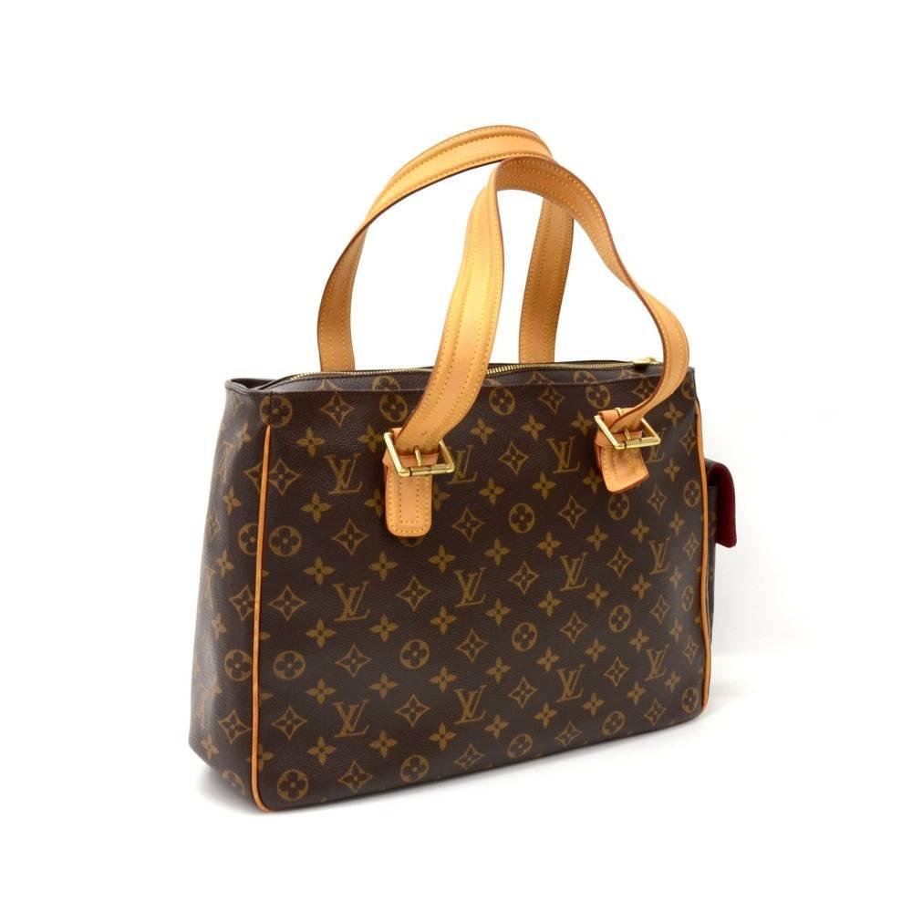 Louis Vuitton Multipli cite shoulder Bag in monogram canvas. Secured with a zipper closure. Outside has 3 flap pockets with magnetic closure. Inside has 2 open pockets and alkantra lining. 

Made in: France
Serial Number: MB0014
Size: 15.4 x 10.6 x