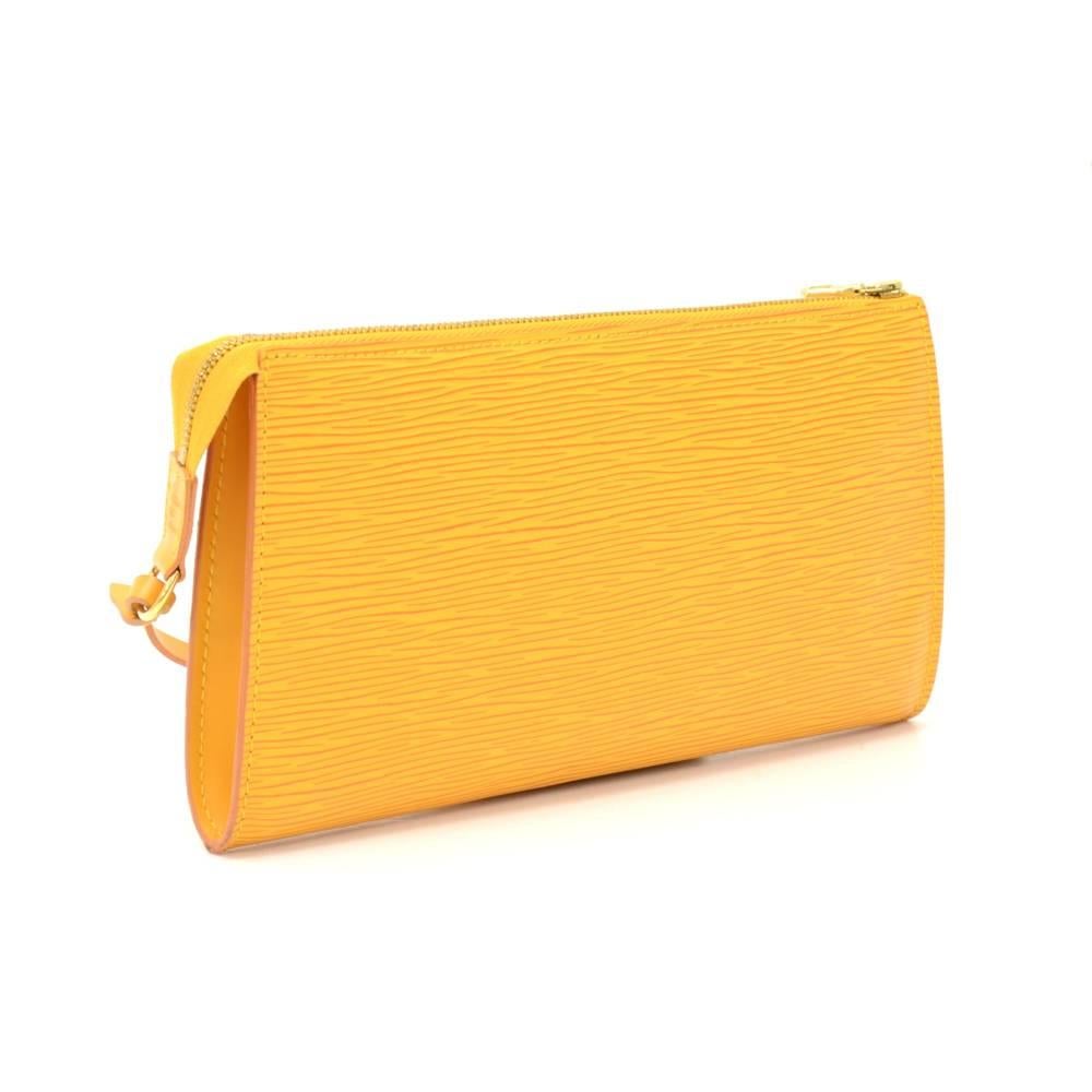 Louis Vuitton pochette accessories in yellow epi leather. Has a beautiful purple alkantra lining. Perfect for a night out and parties. It can be either hand-held or linked to the D-ring found in many Louis Vuitton bags.

Made in: France
Serial