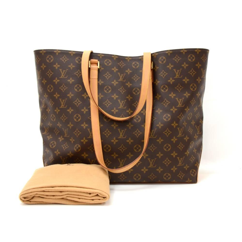 Louis Vuitton Cabas Alto shoulder bag in monogram canvas. Inside has brown lining, 1 zipper pocket and pocket for cell phone or glasses. Very popular item long discontinued!

Made in: France
Serial Number: AR0030
Size: 20.5 x 15 x 6.3 inches or 52 x