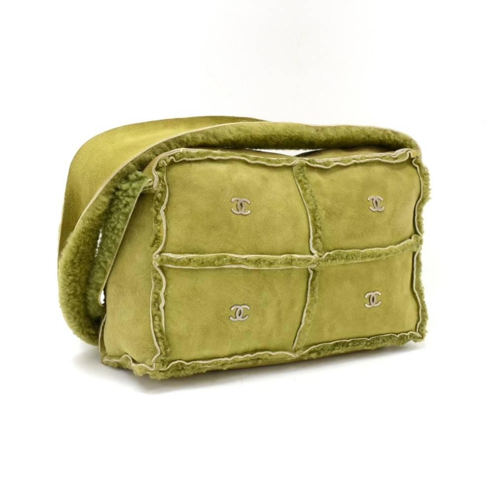 Chanel green mutton leather handbag. It has zipper closure with 4 CC logo on front. Inside has 1 open pocket. Carried on shoulder. Light weight and perfect for daily use.

Made in: France
Serial Number: 6165068
Size: 9 x 5.5 x 3.1 inches or 22.9 x