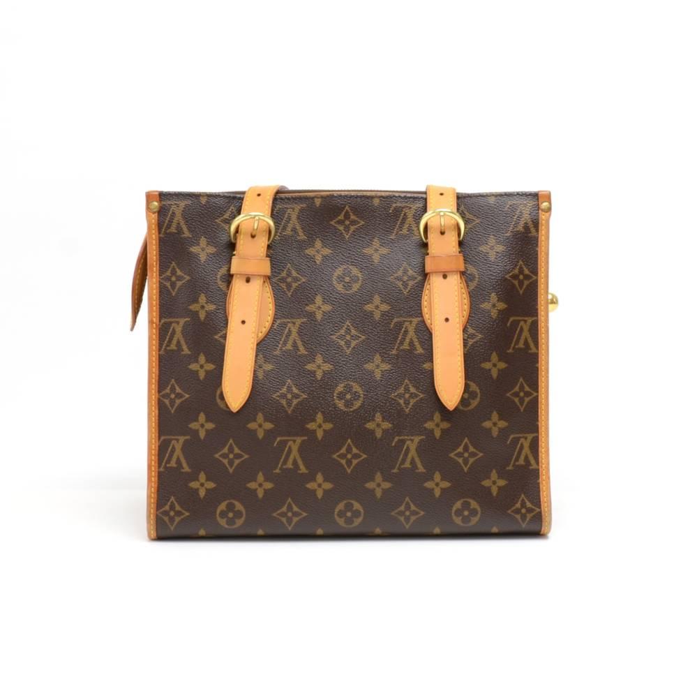 Louis Vuitton Popincourt Haut bag in Monogram Canvas. Top secured with zipper and nice orb charms attached to the zipper pull. Inside is in brown canvas lining with 1 open pocket and 1 for mobile or glasses. Comfortably carry in hand or on shoulder.