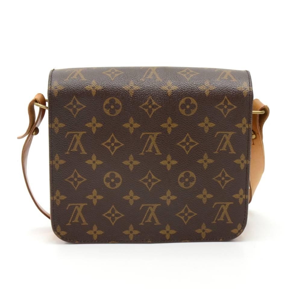 Vintage Louis Vuitton Cartouchiere MM in monogram canvas. Flap top secured with belt closure. Inside is brown washable lining. Comfortably carry on shoulder or across body with cowhide leather strap. 

Made in: France
Serial Number: SL0942
Size: 8.3