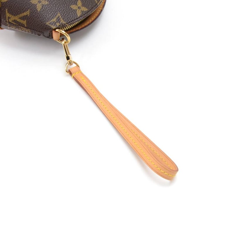 Louis Vuitton Mini Ellipse Monogram Canvas Wristlet Clutch Bag at 1stDibs