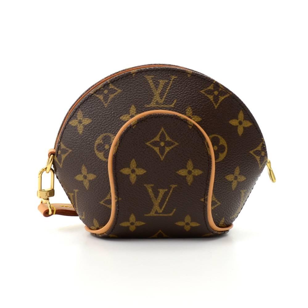 Louis Vuitton Mini Ellipse Wristlet Clutch in monogram canvas. Easy access secured with a zipper and spacious interior.  Inside has brown lining. SKU: LO054

Made in: France
Serial Number: TH1005
Size: 6.1 x 2.8 x 4.7 inches or 15.5 x 7 x 12