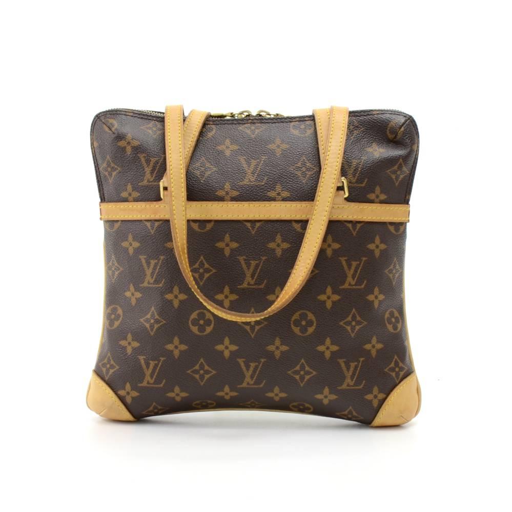 This is Louis Vuitton Coussin GM shoulder Bag in monogram canvas. It has double zipper closure and 1 exterior open pocket. On the inside has red alkantra lining with 1 open pocket and 1 for mobile. Great size to keep you organized.  SKU: LO489

Made