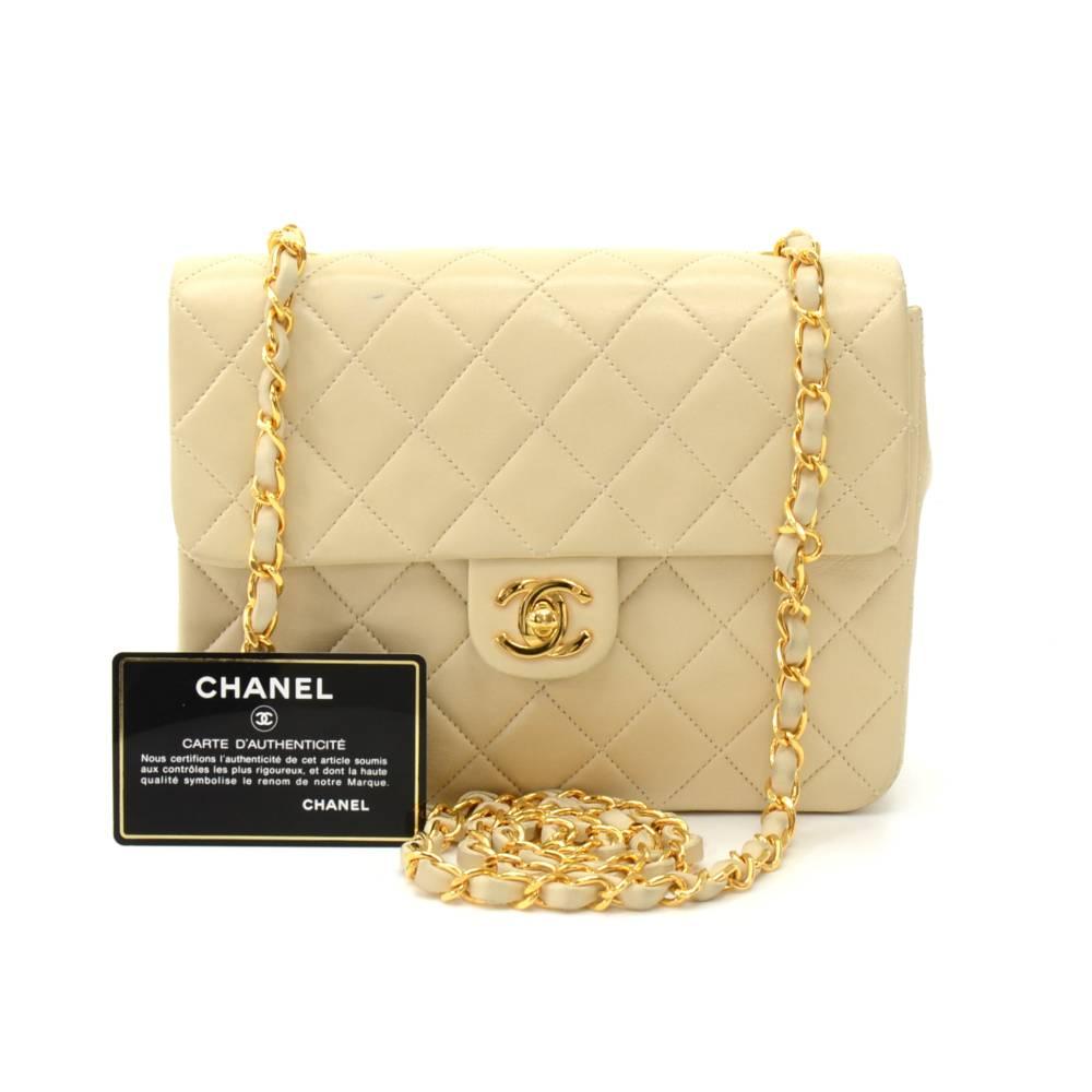 Vintage Chanel beige quilted leather mini bag. It has flap and CC twist lock on the front. Inside has beige leather lining and 2 pockets; 1 zipper and 1 open slit into 3 compartment. Has a single detachable leather and gold chain. It can be used as