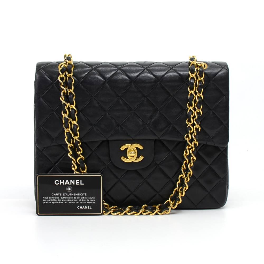 Chanel black quilted leather bag with double flap. It has CC twist lock on the front flap. Second flap has stud closure. Underneath it, there is one slip in pocket and inside lining is in famous Chanel red leather. One interior zipper pocket and 1