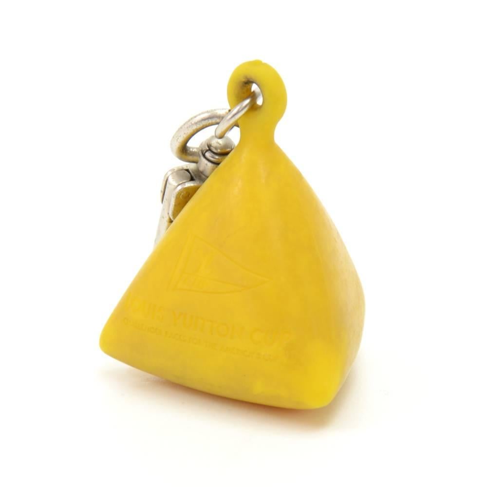 Louis Vuitton yellow rubber key holder. This is a limited edition from the LV cup of the year 2007. LOUIS VUITTON engraved on the ring of the key holder. Perfect for everyday to stay organized in style!Entire length including D-ring: app 10.5cm or