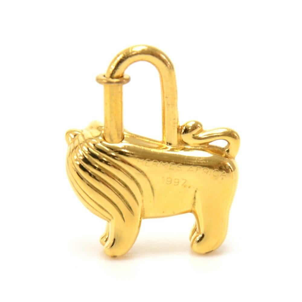 Vintage Hermes Gold Tone Africa Lion Cadenas Lock.  Hermes used to issue an annual Cadenas lock for the front of their Classic Kelly, Birkin, or Bolide Hand bags. This is the 1997 limited edition Africa Lion Lock. Has 