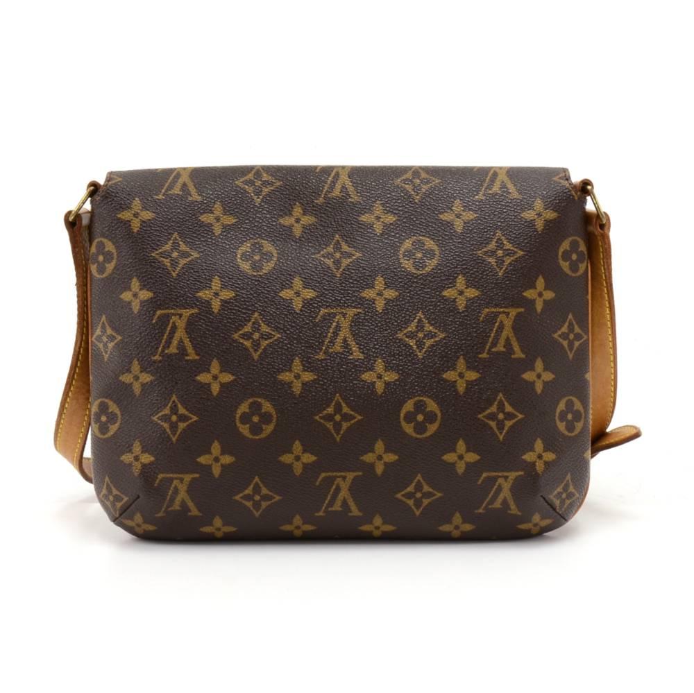 Louis Vuitton Musette Tango shoulder bag in monogram canvas. It has a magnetic flap closure and the inside has a brown alkantra lining and one open slip pocket. Comes with an adjustable strap and can be worn on the shoulder. SKU: LO568

Made in: