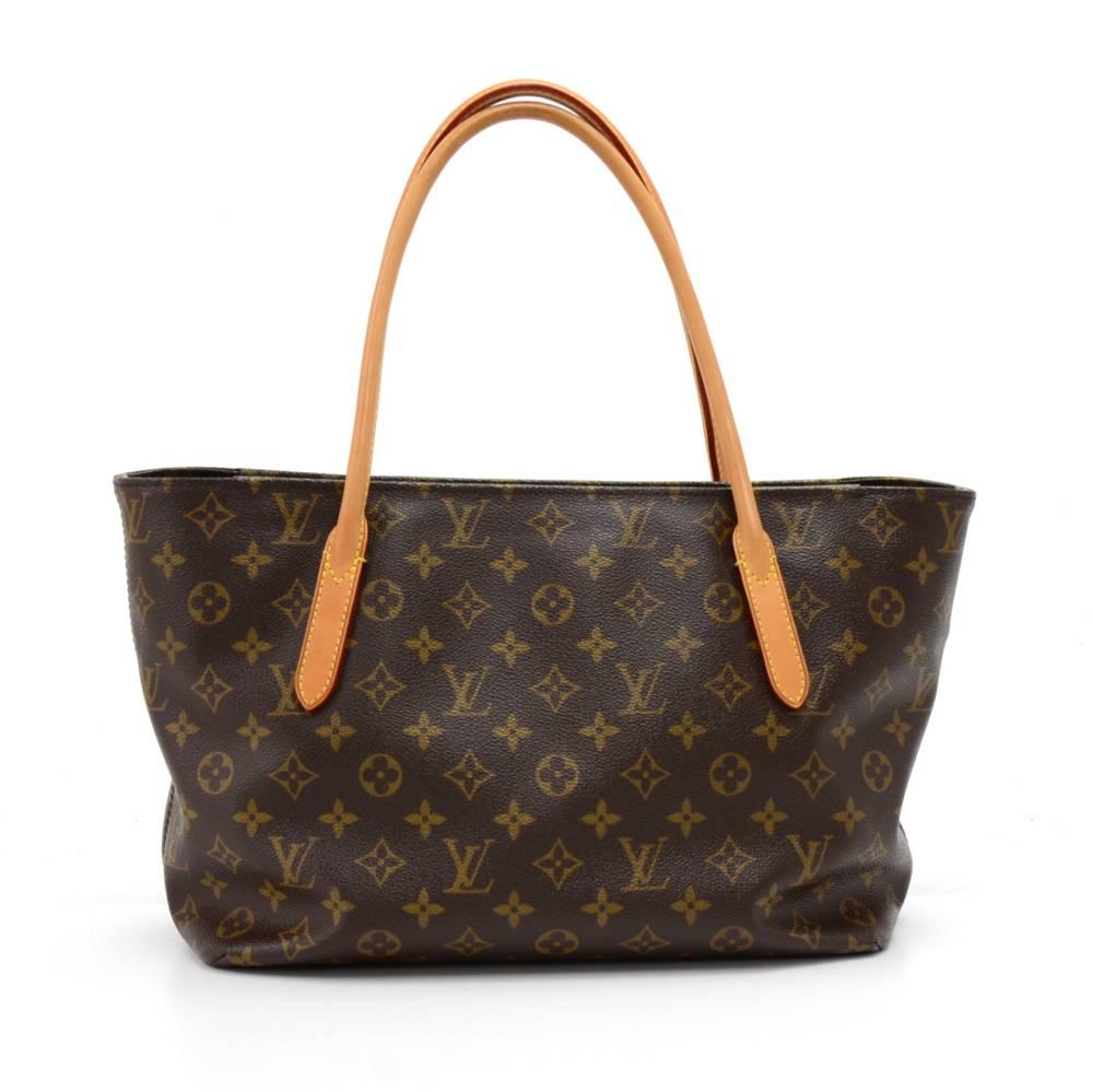 Louis Vuitton Raspail PM tote bag in monogram canvas. Top has a zipper closure. Inside has lovely purple fabric lining with 1 zipper pocket. Great for daily use. SKU: LO529

Made in: Spain
Serial Number: CA 1102
Size: 16.1 x 9.1 x 5.1 inches or 41 x
