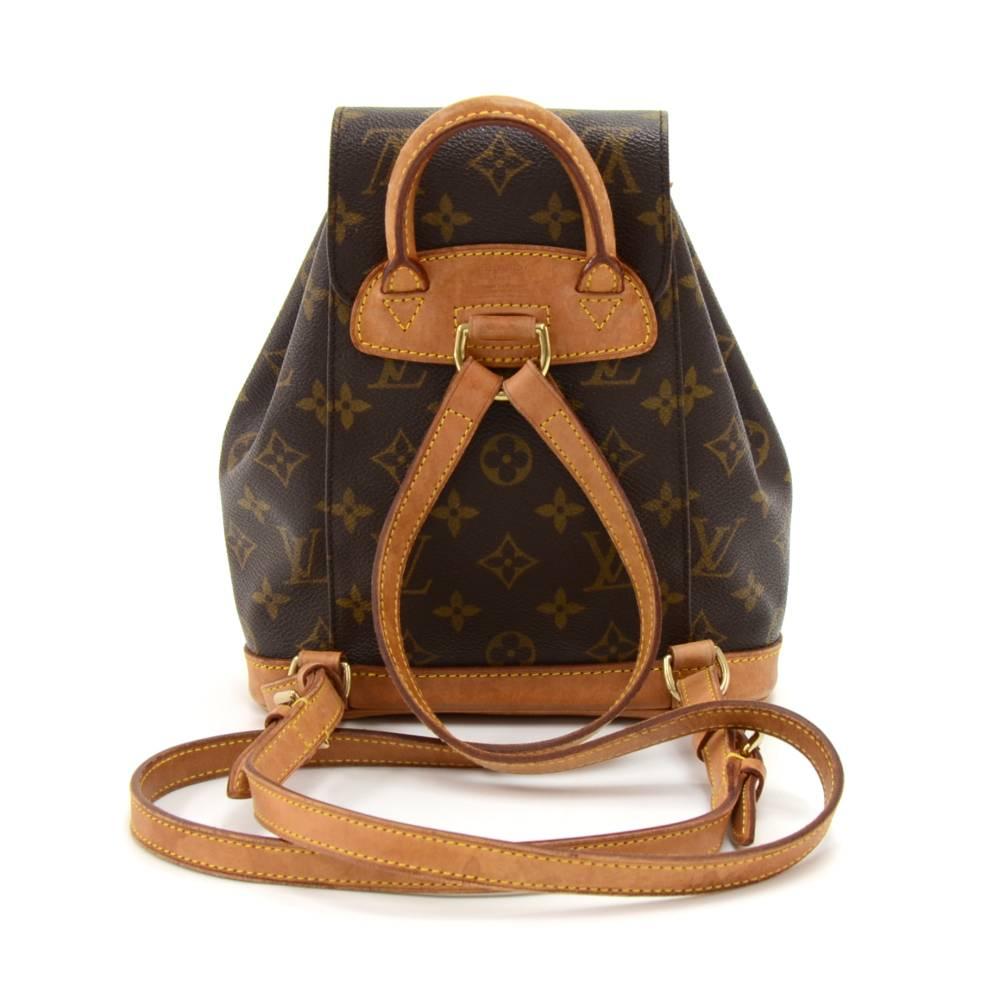 Louis Vuitton Mini Montsouris backpackin monogram canvas. It has 1 zipper pocket on the front. It has leather string closure with flap top for security. Spacious and classy, it would make a great companion wherever you go! SKU: LO668

Made in: