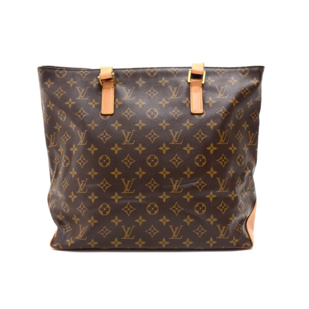 Authentic Louis Vuitton Cabas Mezzo shoulder bag in monogram canvas. It has zipper closure. Inside has one pocket with a zipper and 1 pocket for cell phone or glasses. It can be carried on shoulder or in hand. Comes with a D ring inside the bag seen
