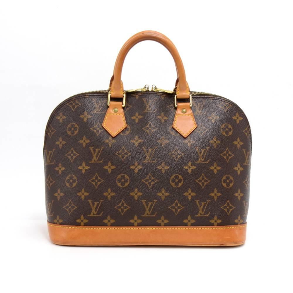 Vintage Louis Vuitton Alma in monogram canvas. With its shapes invented by Gaston Vuitton in the 1930’s, Alma is now a classic. Hand-held and closed with a double zipper. Inside has brown lining and one open slip pocket. SKU: LO752

Made in: