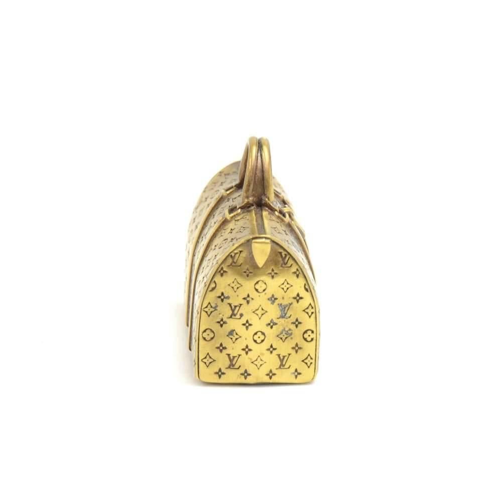 Louis Vuitton gold-tone paperweight in the classic Louis Vuitton Keepall motif. Very lovely item given to Louis Vuitton's VIP Members. A great collector's item!  
