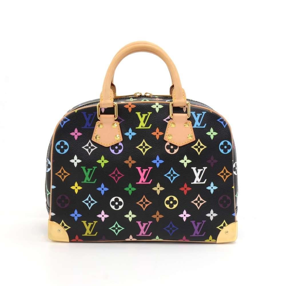 Louis Vuitton Trouville bag in Multicolor monogram canvas. It has gold-tone stud details to give it an edge. Outside has 1 slip pocket. Double zipper closure opens up large access to the interior. Inside has dark brown alkantra lining and 1 open