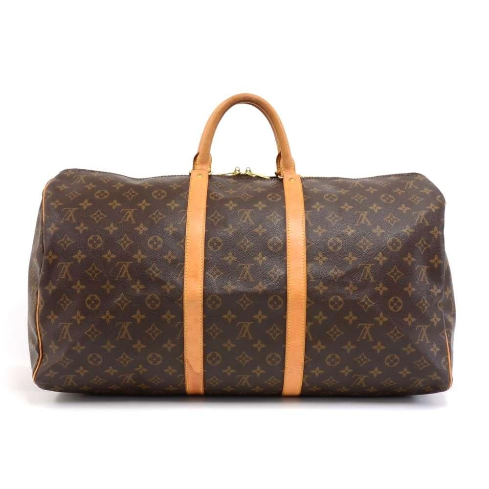 Louis Vuitton Keepall 55 is a classic of the Louis Vuitton travel bag collection. This spacious large sized version in Monogram canvas and a double brass zipper. A great companion wherever you go. SKU: LQ073

Made in: France
Serial Number:
