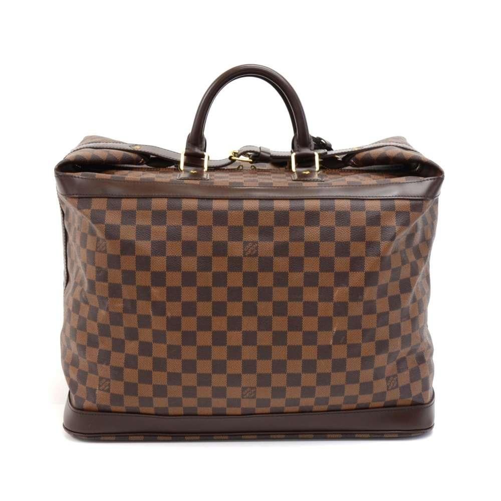 Louis Vuitton Grimaud bag 45 Damier Ebene Canvas Bag.Easy access with double zipper secured with a top leather belt and buckle. Inside has 1 open pocket. 5 brass feet on the bottom of the bag for protection. Perfect size to keep you organized for