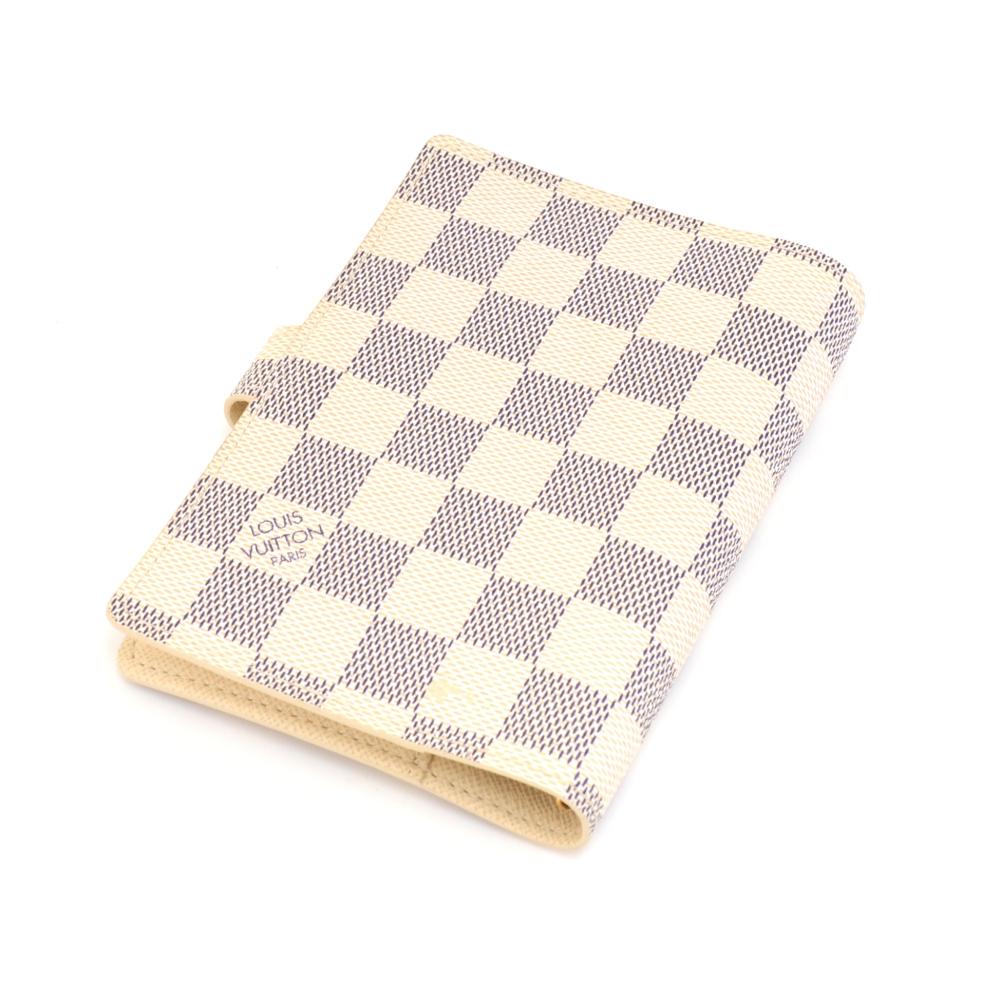 Louis Vuitton Agenda Fonctionnel PM agenda cover. It has 3 card slots, 2 side slip pockets, and a small pen holder.It has 6 gold-tone rings. Refill papers can be bought at the LV store or you can use any generic6-ring papers! SKU: LP592

Made in: