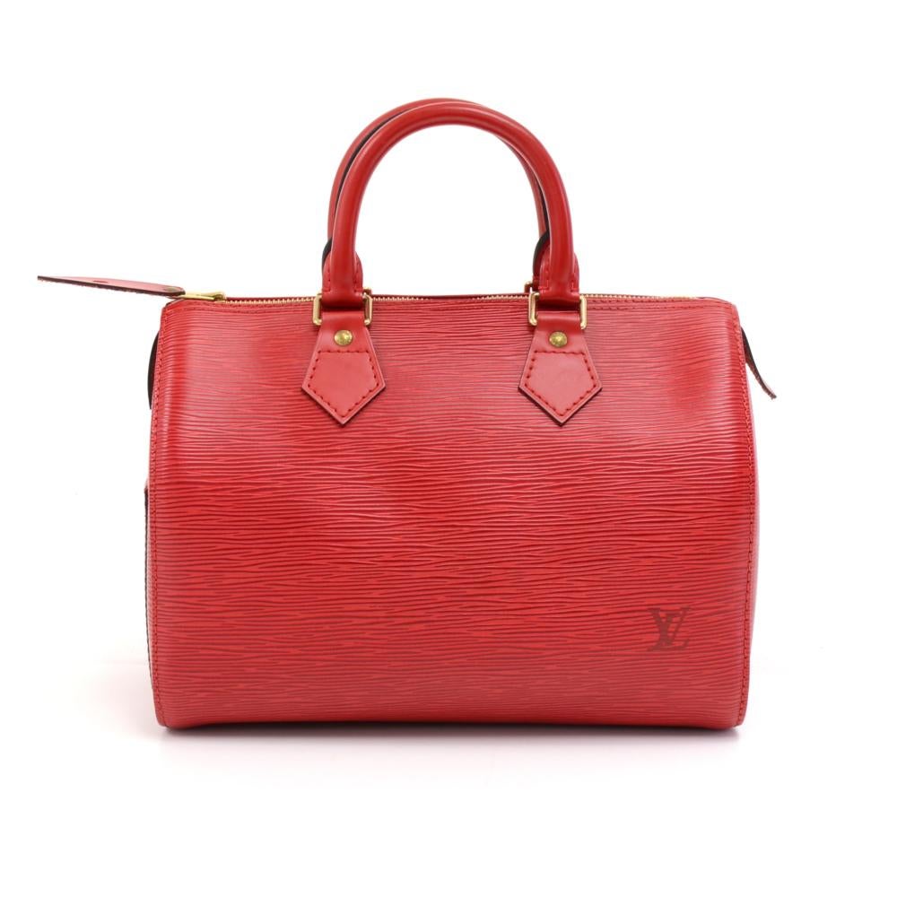Louis Vuitton epi leather speedy 25 hand bag. Inspired by the famous keep all travel bag, it has zip closure. This bag in Epi leather is perfect for carrying everyday essentials. One of the most popular shapes from Louis Vuitton. 
SKU: LQ111

Made