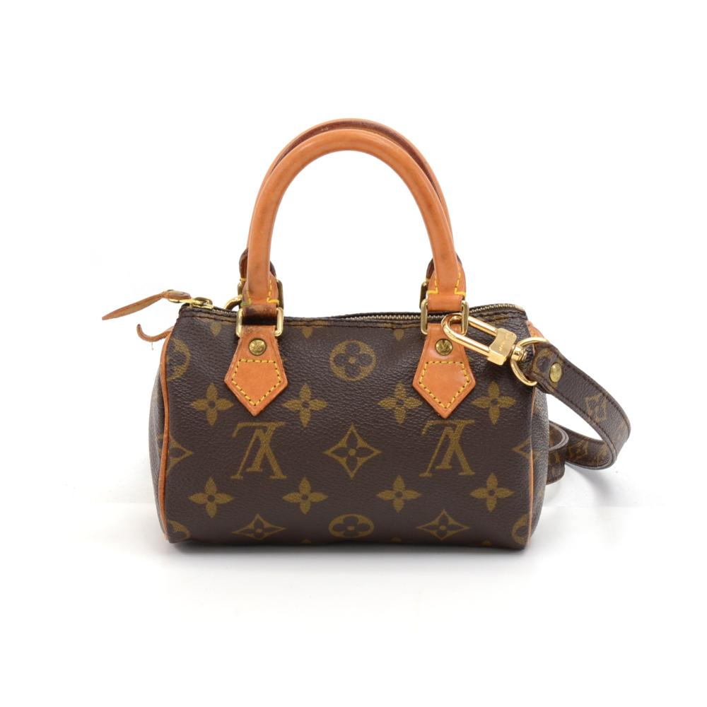 Vintage Louis Vuitton handbag Mini Speedy Sac HL, one of the most popular line in LV monogram canvas. Brass zipper securing access. Inside is brown lining. Can be carried in hand, on the shoulder, or across the body with the detachable monogram