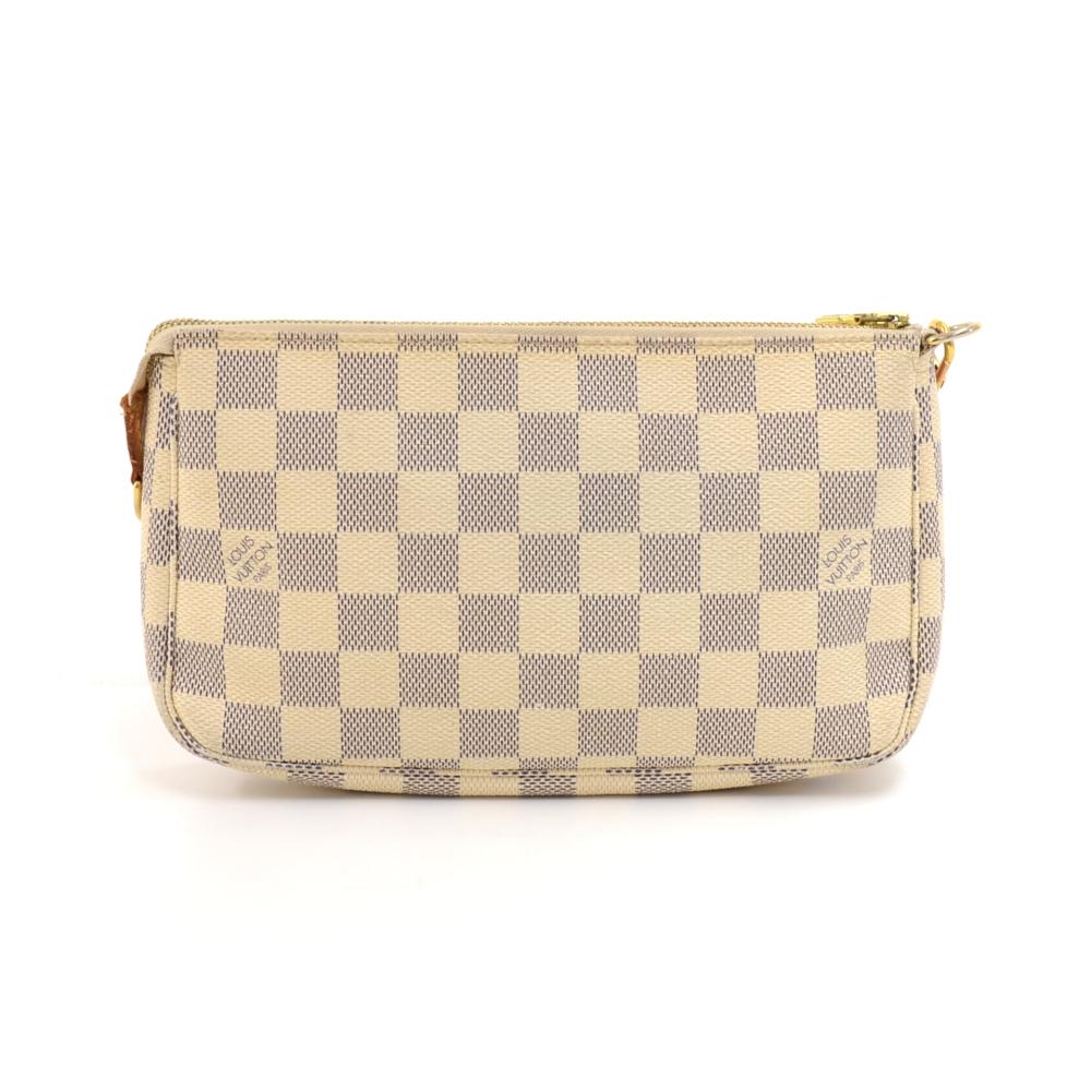 Louis Vuitton Pochette Accessories in Damier Azur canvas. It stores beauty products and other daily essentials. Perfect for a night out and parties. It can be either hand-held, carried on the shoulder, or across the body with the detachable cowhide