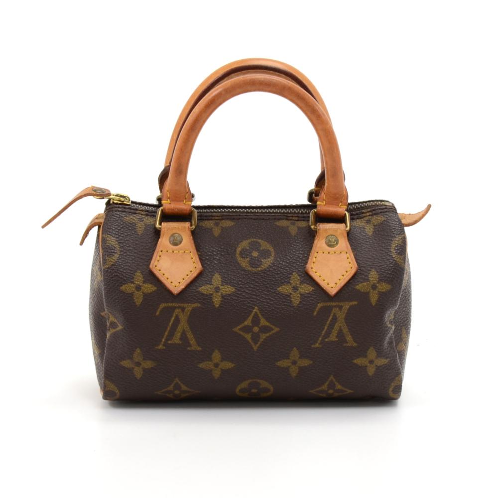 Vintage Louis Vuitton handbag Mini Speedy Sac HL, one of the most popular line in LV monogram canvas. Brass zipper securing access. Inside is brown lining. Very cute item to have. SKU:LQ368 

Made in: France
Serial Number: TH0952
Size: 5.9 x 3.9 x
