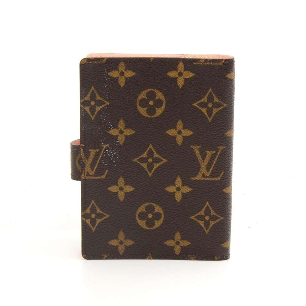 Louis Vuitton monogram Agenda PM Koala agenda cover.  It has a small strap with a push lock to secure the cover and inside is lined with light pink canvas and has 2 slip pockets and 3 card slots. This agenda has 6 rings and you can buy the refill